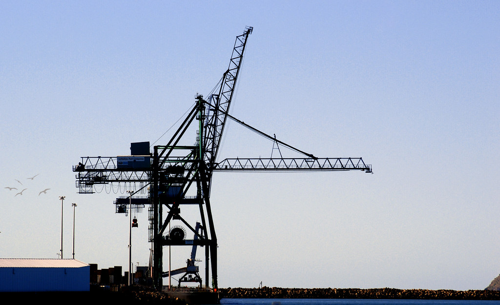 Cargo containers and palletized loads staged for cross-border shipment